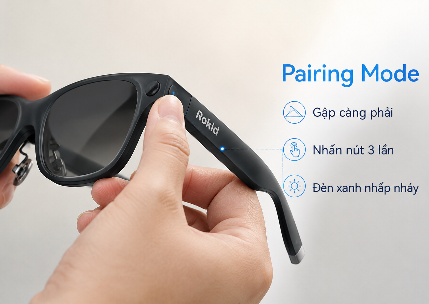 Cận cảnh thao tác đưa Rokid Glasses Display vào pairing mode bằng nút chức năng.